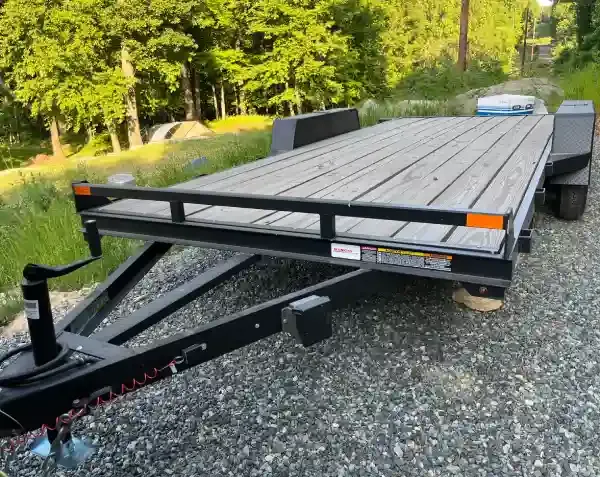 Flatbed trailer with side rails available for rent from Hawk Ridge Trailer Rentals